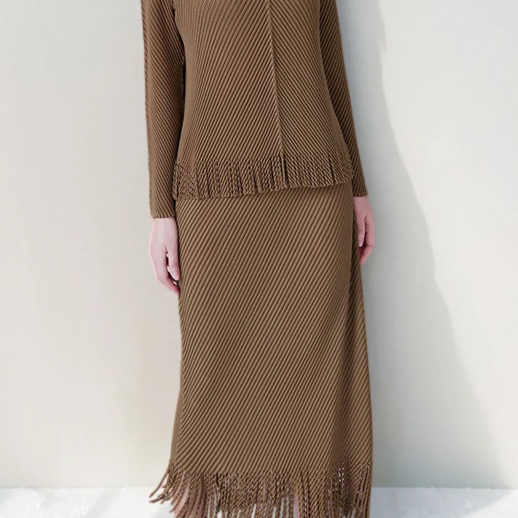2025 Design sense niche tassel fashion suit noble women's clothing medium and long hip skirt pleated temperament two-piece set Popular style
