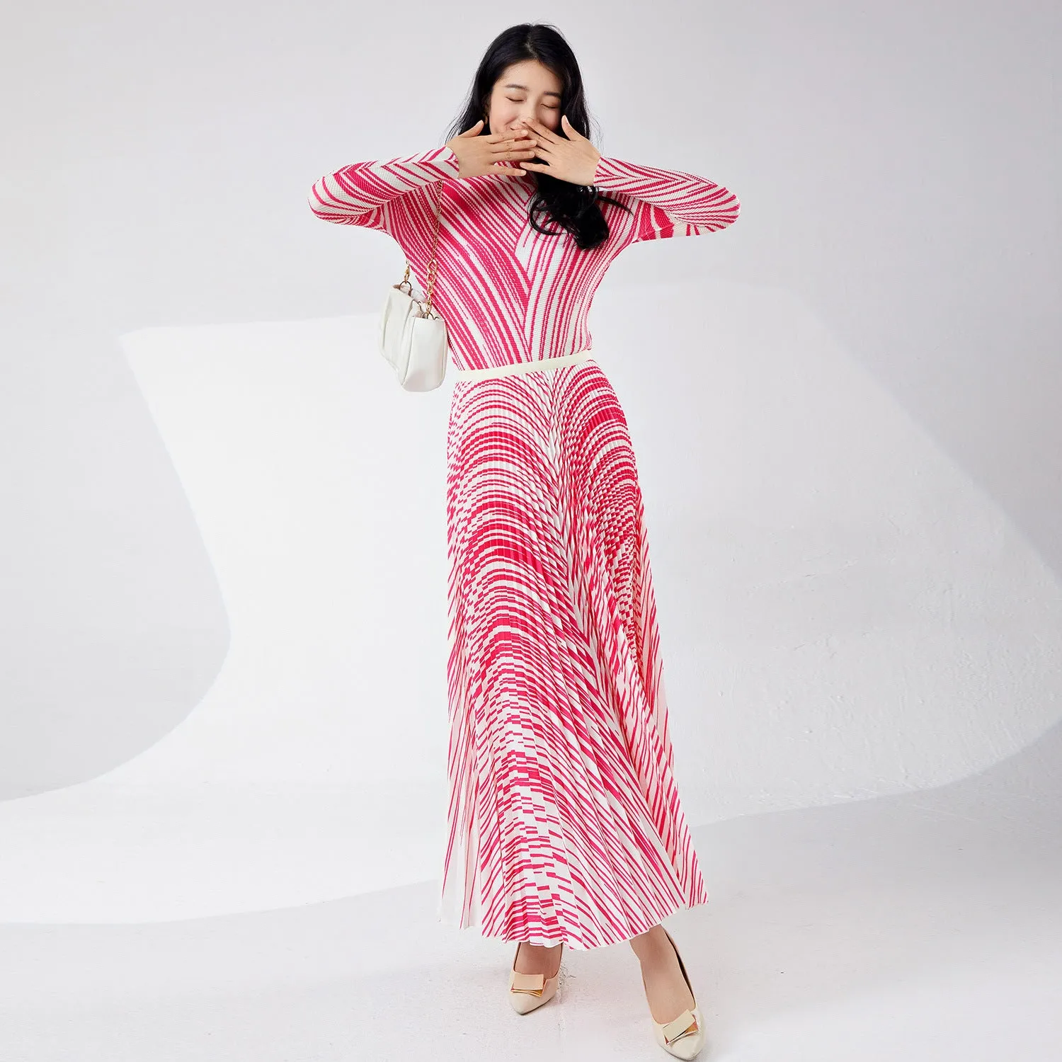 2025 Pleated suit skirt spring women's design sense new striped long-sleeved T-shirt top drape elegant skirt two-piece set