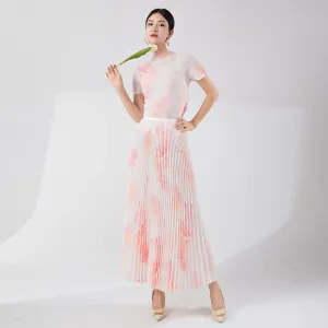 2025 Tall summer temperament suit women's two-piece set Nanyou high-end women's clothing printed short-sleeved pleated top skirt