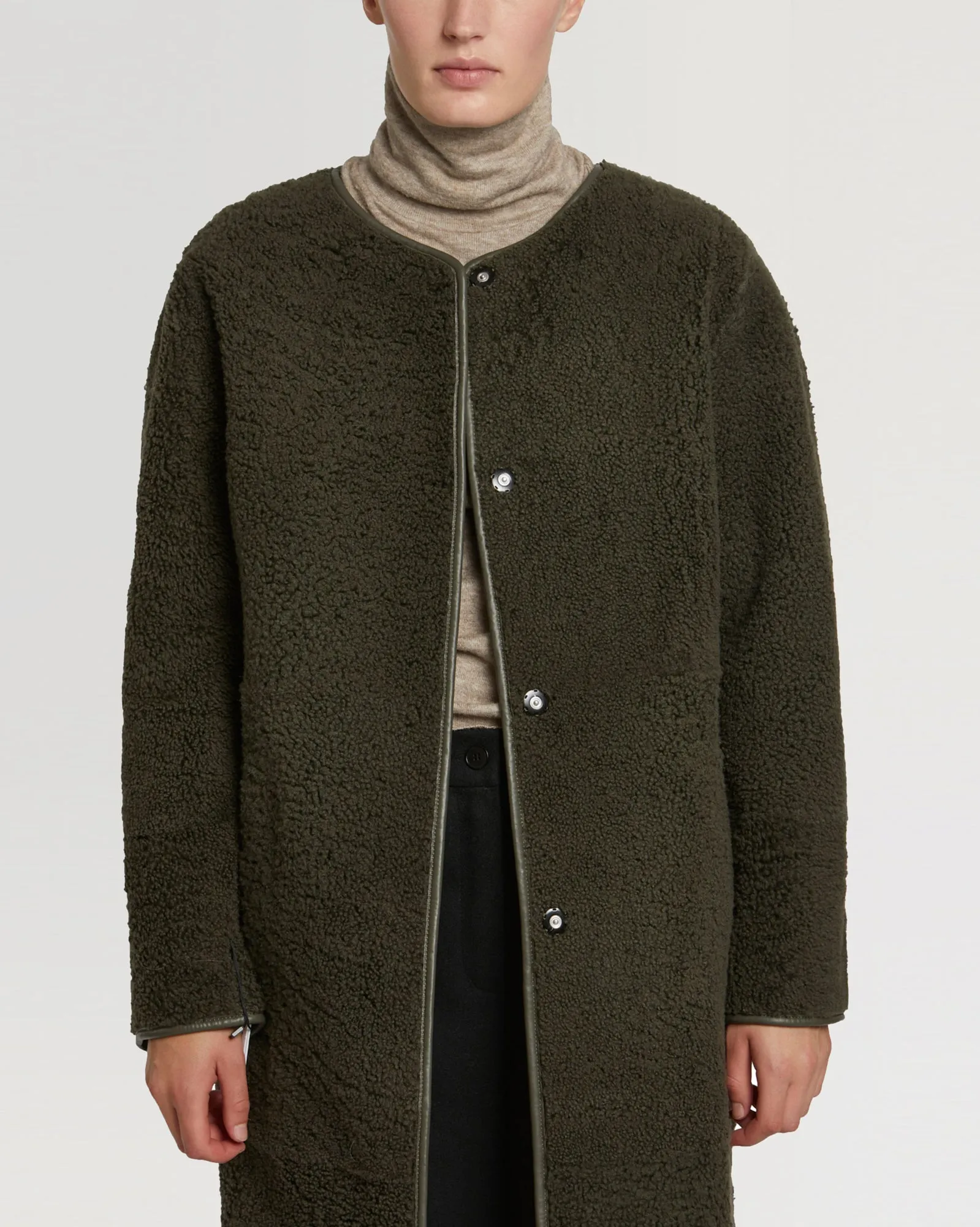 Reversible merinillo lambskin shearling and woollen fabric belted coat